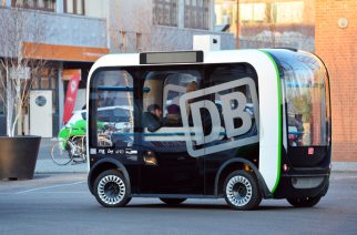The driverless mini bus 'Olli' drives around the office grounds of Euref during a test run in the district of Schoeneberg in Berlin, Germany, 5 December 2016. The US-American compoany Local Motors wants to manufacture self-driving buses in Berlin. 50 buses are planned for the next year. Self-driving mini bus 'Olli' offers space for twelve passengers and reaches up to 20 kilometers per hour. Photo: Maurizio Gambarini/Maurizio Gambarini/dpa | Verwendung weltweit